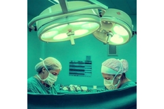 Image Doctors performing surgery.
